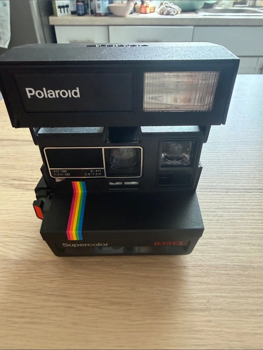 Polaroid Supercolor 635CL Instant Camera in Black with Rainbow Stripe